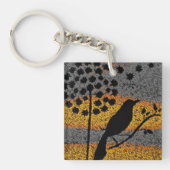 Een vogel onder de veren sleutelhanger (voorkant)