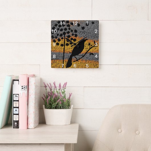 Een vogel onder de veren vierkante klok (Leeskamer)