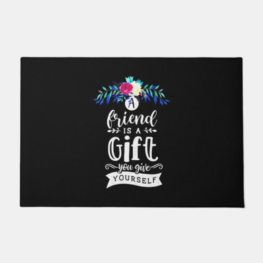 Een vriend is een cadeau. deurmat (Voorkant)