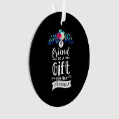 Een vriend is een cadeau. ornament (voorkant)