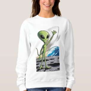 Een vriendelijke alien zwaait trui