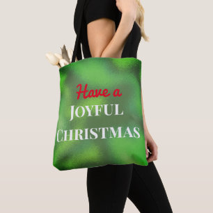 Een vrolijke kersttypografie laten zien die is afg tote bag