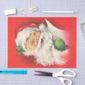 Een vrolijke knipogende kerstman die zijn lijst le tissuepapier (Craft)