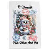Een vrolijke sneeuwman naast een feestelijke kerst medium cadeauzakje (Voorkant)