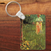 Een vrouw die in een tuin loopt door Vincent van G Sleutelhanger (Voorkant)