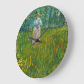 Een vrouw die in een tuin loopt - Vincent van Gogh Grote Klok (Hoek)