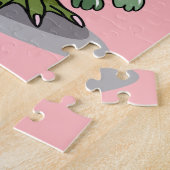 Een Vrouw Hadrosaurus met een pop. Legpuzzel (Zijkant)