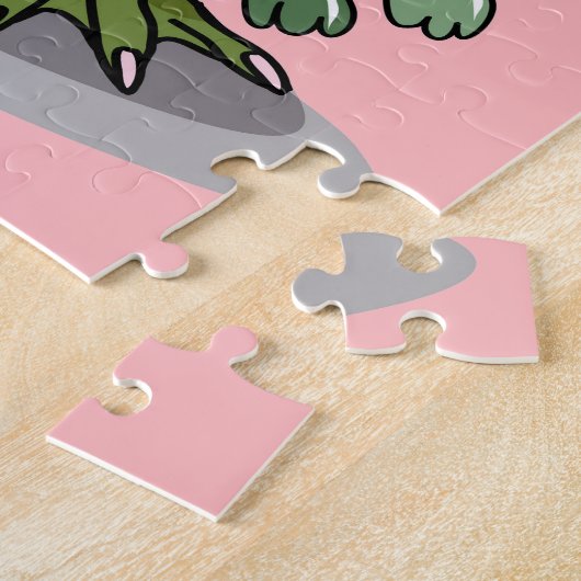 Een Vrouw Hadrosaurus met een pop. Legpuzzel (Zijkant)