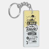 Een wandeling op het strand is altijd een goed ide sleutelhanger (Voorkant Links)