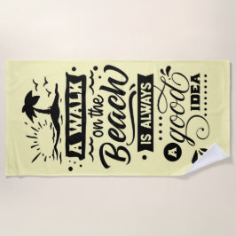 Een wandeling op het strand is altijd een goed ide strandlaken