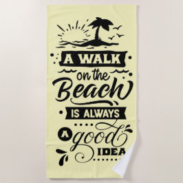 Een wandeling op het strand is altijd een goed ide strandlaken