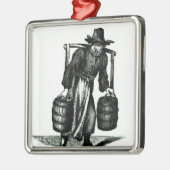 Een waterdrager metalen ornament (Links)