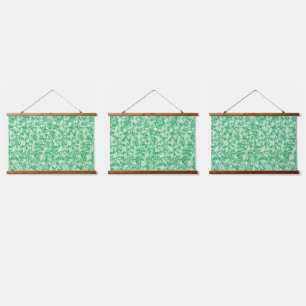 Een weelderige, groene varen met delicate, boogvor hangend wandkleed