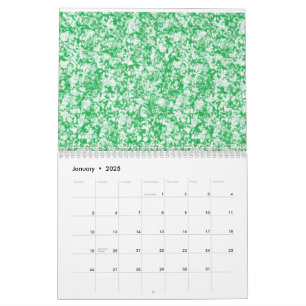 Een weelderige, groene varen met delicate, boogvor kalender