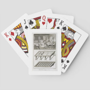 Een werkplaats en gereedschap van de spiegelmaker, pokerkaarten
