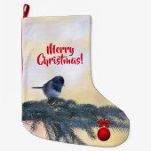 Een wintervogel en een kerstversiering op een grote kerstsok (Voorkant)