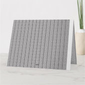 Een wit en grijs geometrisch patroon vult het afbe kaart (Achterkant)