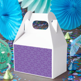 Een wit inpakpapier met een herhalend patroon van bedankdoosjes