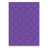 Een wit inpakpapier met een herhalend patroon van kaart (Achterkant)