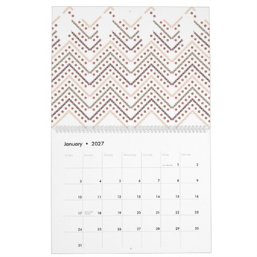 Een witte achtergrond met bruine en rode stippen kalender (Jan 2027)