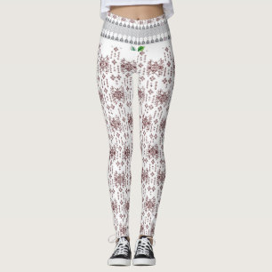 Een witte achtergrond met een rood patroon erop leggings