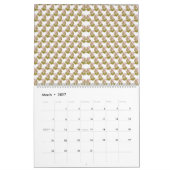 Een witte achtergrond met groene bladeren erop kalender (Mar 2027)