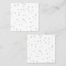 Een witte achtergrond met veel kleine stippen contactkaartje