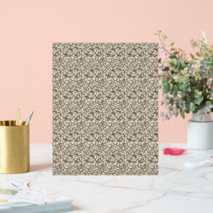 Een witte en bruine achtergrond met kleine bruine acryl bord