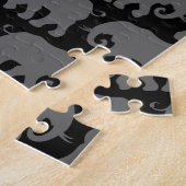 Eén witte olifant in een kudde legpuzzel (Zijkant)