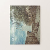 Een witte vuurtoren en een olijfboom legpuzzel (Verticaal)