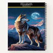 Een wolf huilt bij de opkomende maan notitieboek (Achterkant)