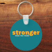 Één woord dat Sterker Inspirerend Citaat zegt Sleutelhanger (Voorkant)
