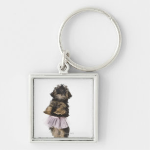 Een Yorkie-poopuppy in een tutu op haar achterpote Sleutelhanger