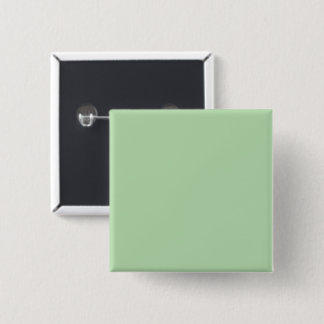 Een zachte bleke groene achtergrond vult de afbeel vierkante button 5,1 cm