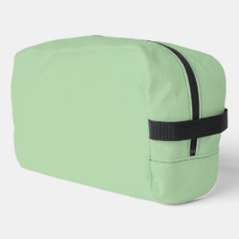 Een zachte bleke mintgroene achtergrond toilettasje