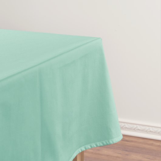 Een zachte mint gedempte effen kleur. tafelkleed (Voorbeeld)