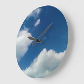 Een zachtheid aan de wolken grote klok (Hoek)