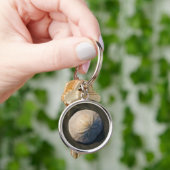 Een zanddollar op het strand sleutelhanger (Hand)