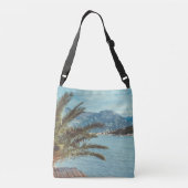 Een zeebaars met bergen en een palmboom crossbody tas (Achterkant)