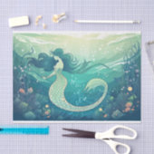 Een zeemeermin in ondiep water gevuld met licht tissuepapier (Craft)