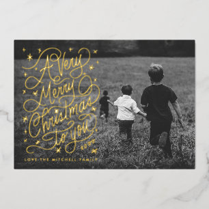 Een zeer kerstelijke kerstkaart met handlettering folie uitnodiging
