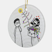 Een zeer smerig kerstversiering keramisch ornament (Links)