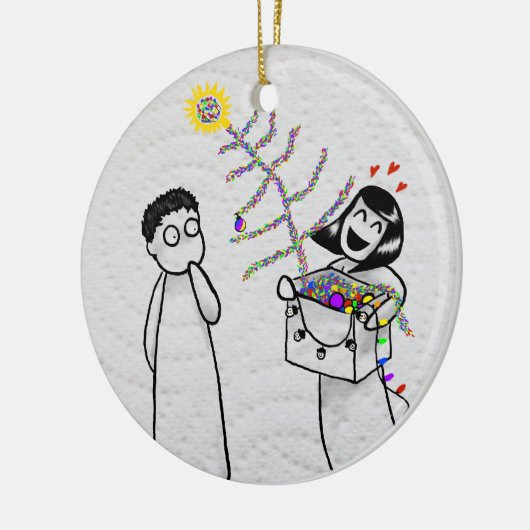 Een zeer smerig kerstversiering keramisch ornament (Links)