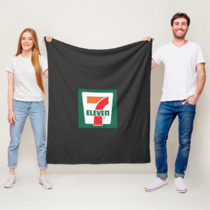 Een zeven logo op een groene achtergrond fleece deken