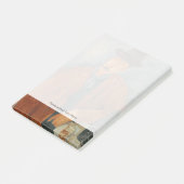Een zittend man dat op een tafel leunt post-it® notes (Schuin)