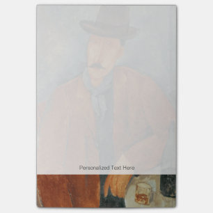 Een zittend man dat op een tafel leunt post-it® notes