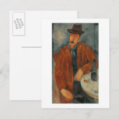 Een zittend man op een tafel briefkaart (Voorkant / Achterkant)