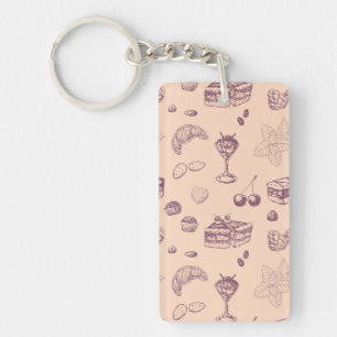 Een zoet patroon met verschillende desserts. sleutelhanger