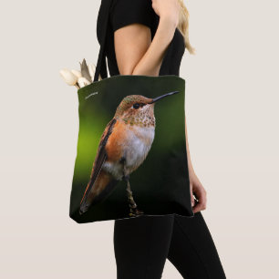 Een zoete roofvogel op de fruitboom tote bag