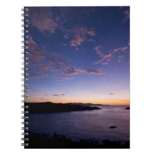 Een zonsondergang over de oceaan in Costa Rica Notitieboek